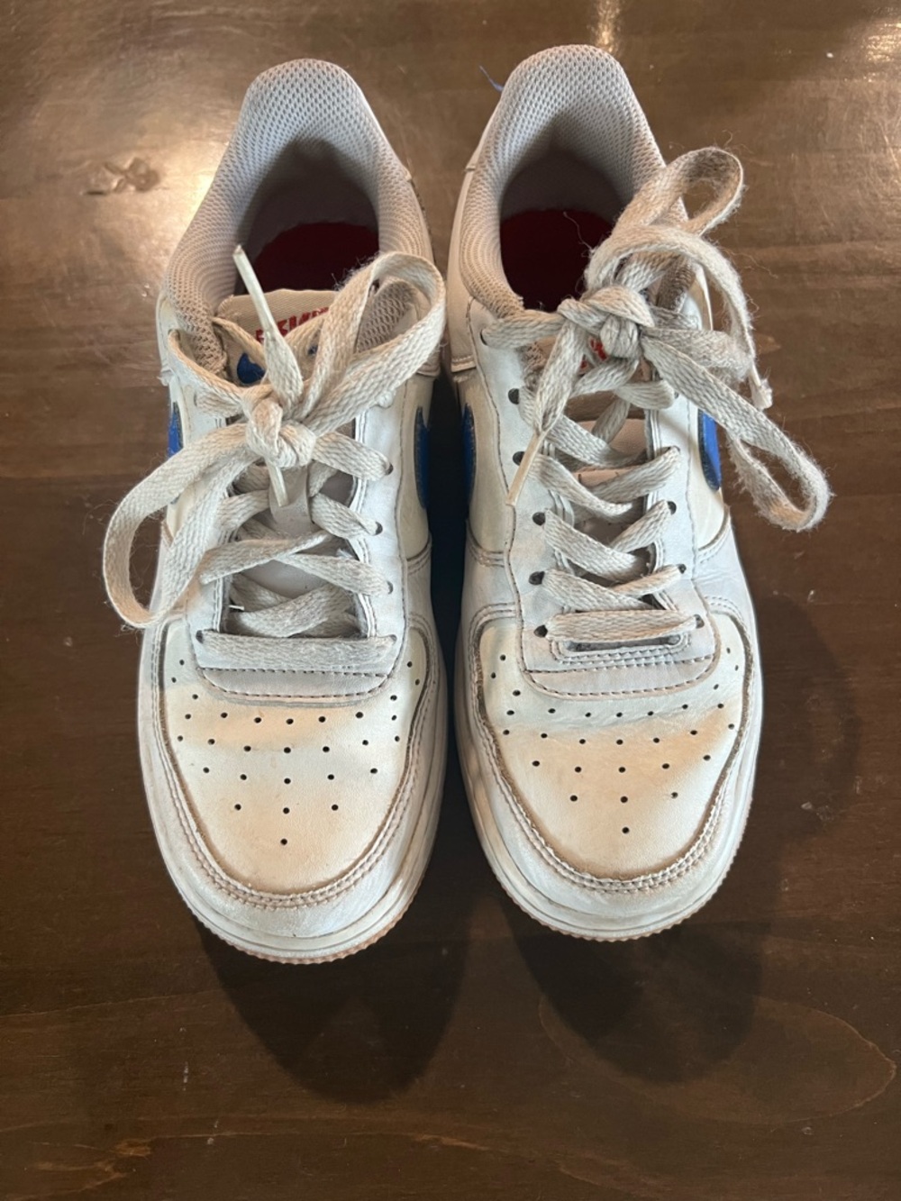 Nike Kids White Sneakers with Blue Swoosh